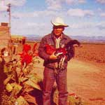 Photo of Santiago with a rooser